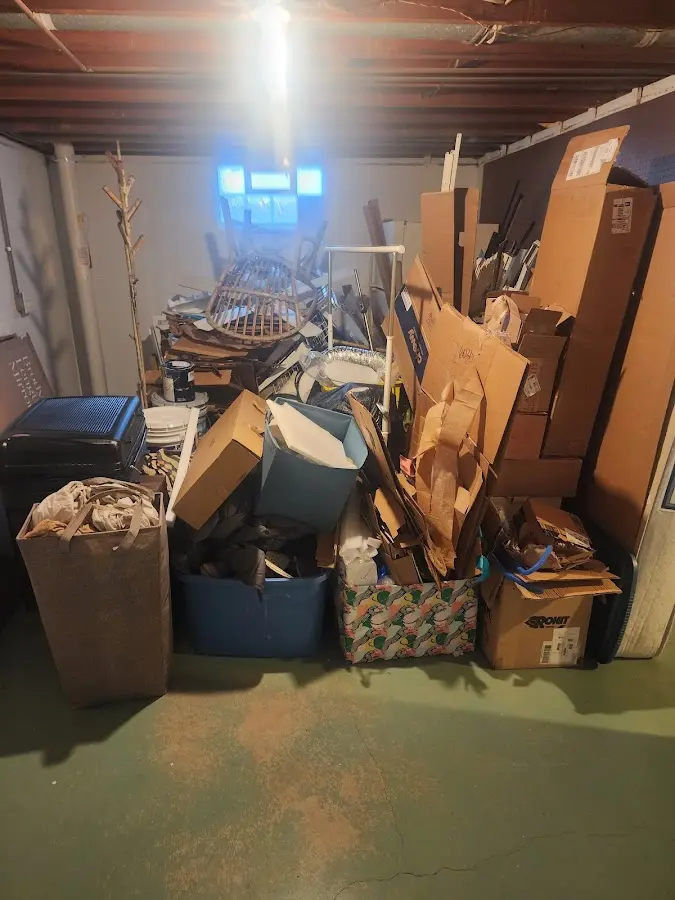 Roll-off dumpster container at job site for 6 Yard Dumpster Rental in Johnston City